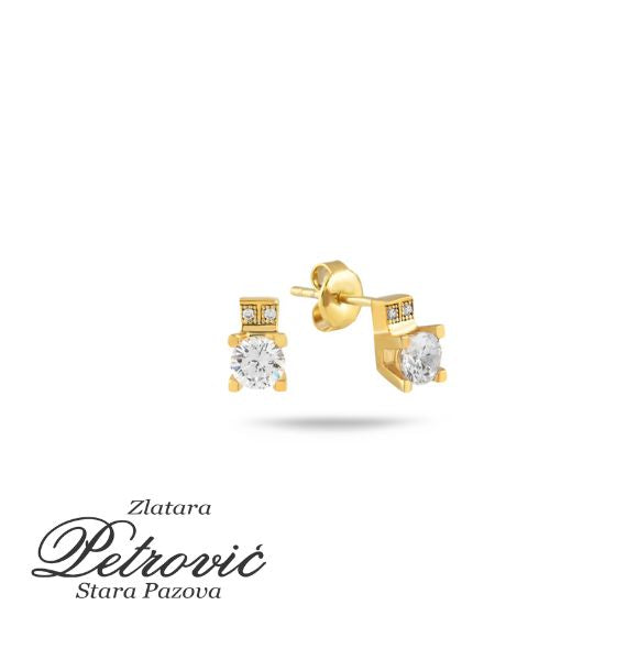 Zlatne minđuše sa jednim krupnim cirkonom i dodatnim sitnim kamenčićima na zlatnom postolju, na beloj pozadini